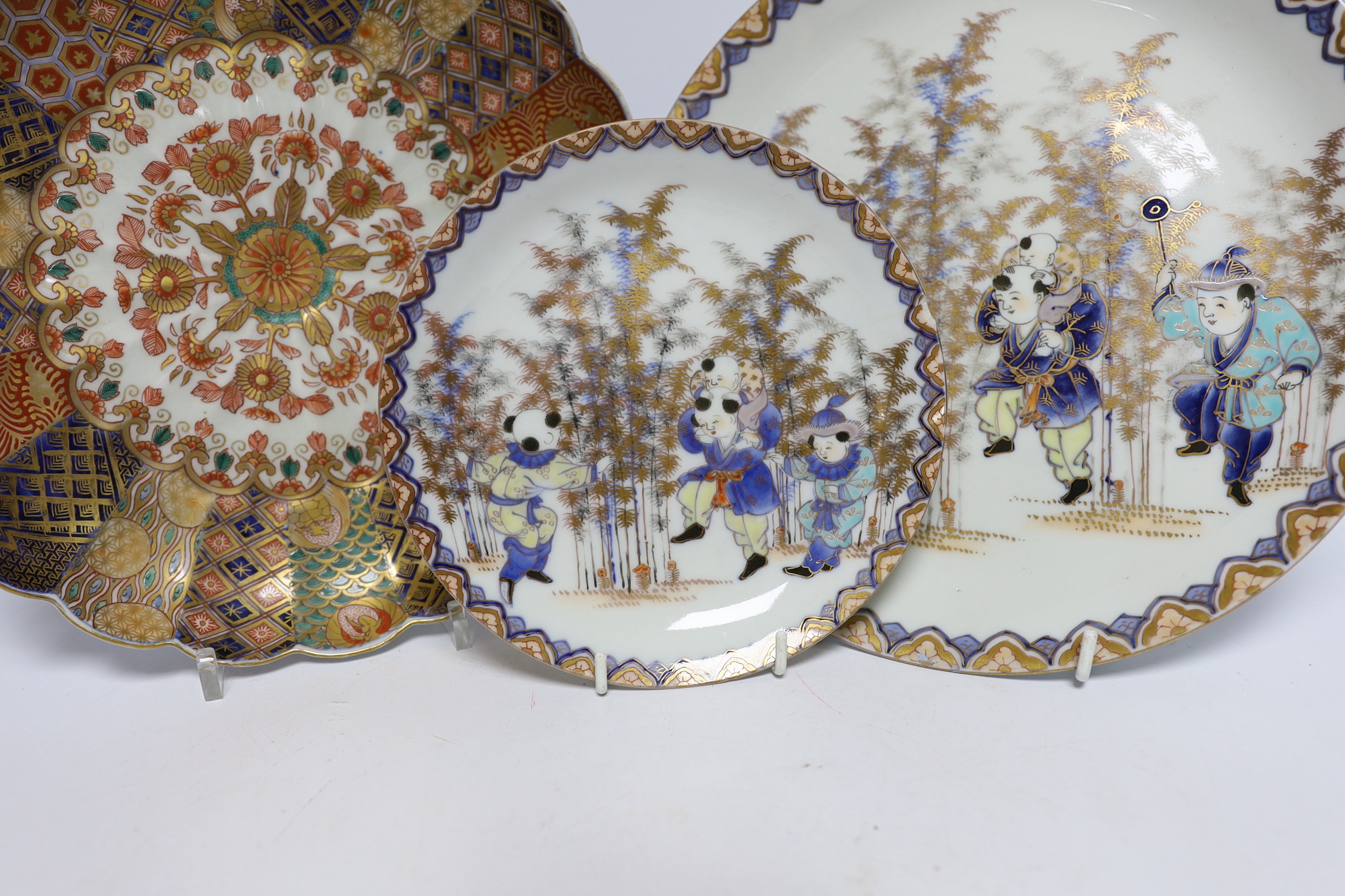 Assorted Japanese ceramics including Imari plate and three satsuma saucers, largest 25cm in diameter